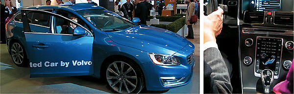 Volvoとエリクソンが共同で展示した、車載システムをネットワーク化した「Connected Car」。写真右はダッシュボードの様子。クラウドなども利用し、地図の表示や、スマートフォンの中の音楽の再生などを行えるシステムになっている。