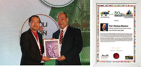 写真1 「世界で最もスマートシティに影響力のある50名」 受賞の様子（左）と賞状（右）
