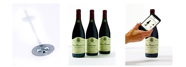 図　左がCorkTag、中央はCorkTagを先行導入した「ドメーヌ・エマニュエル・ルジェ」、右はCorkTagの情報をスマートフォンで読み取っているところ