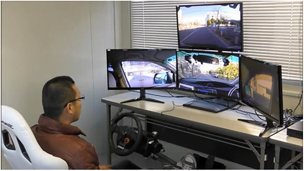 図　遠隔地に設置した運転席で監視しながら、自動運転車を走行させた